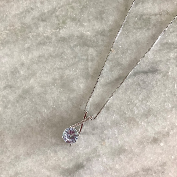 Sterling Silver Criss-Cross Stunning Simulated Diamond Silver Pendant Necklace - Picture 6 of 10